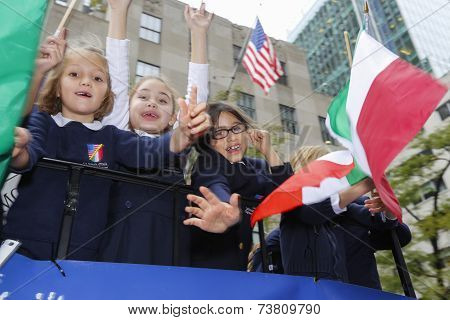 Kids with flag on float