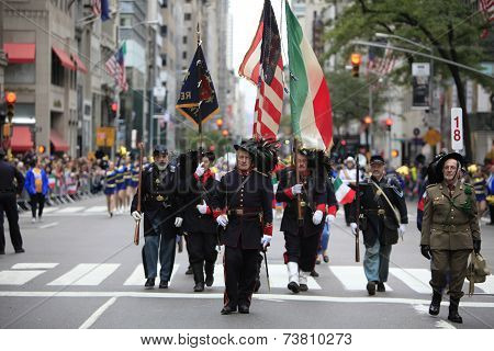 Uniformed marchers color guard