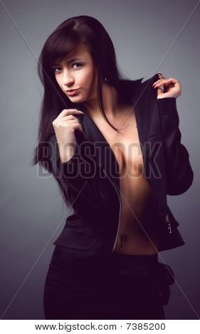 The young girl in a dark suit