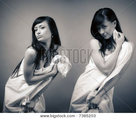 The young girl in a white bed-sheet