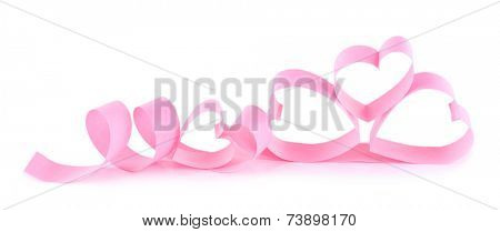 Heart shaped pink paper ribbon isolated on white