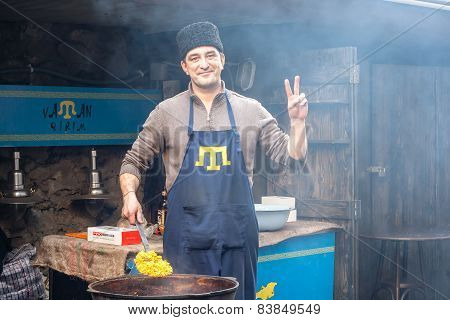 Lviv, Ukraine - February 22, 2015 Crimean Tatar Runs Street Food Business