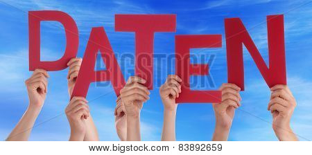 People Holding Red German Word Daten Means Data Blue Sky