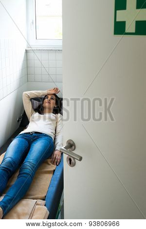 Young woman is relaxing in a quiet room of an office