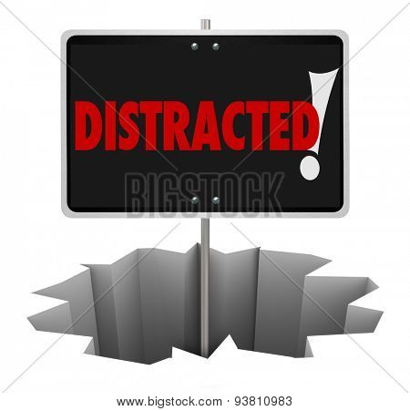 Distracted word on warning sign in a deep hole to illustrate danger, hazard or risk and the need to pay attention
