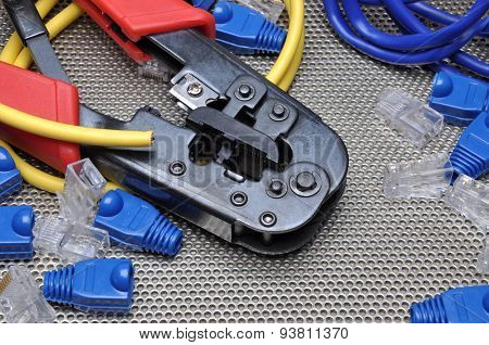 Crimping tool with network cable and connectors