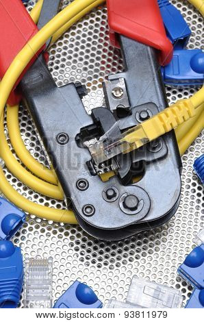 Crimping tool with network cable and connectors