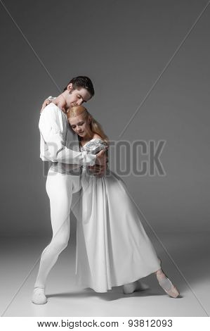 Two young ballet dancers practicing. attractive dancing performers  in white