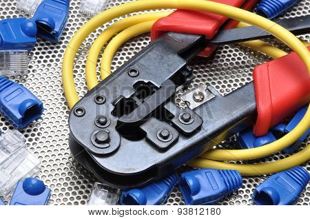 Crimping tool with network cable and connectors