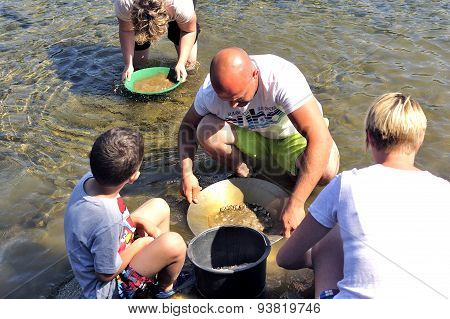 Gold Prospectors Of All Ages On The Banks Of The Gardon River