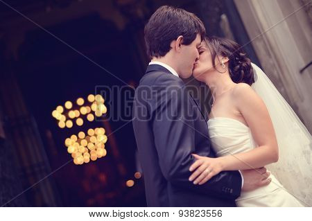 Bride And Groom In Front Of The Curch