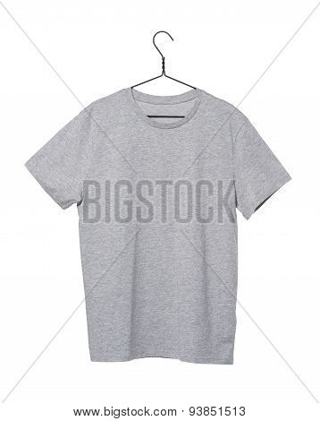 Close-up Of The Grey T-shirt On The Clothes Hanger. Isolated.