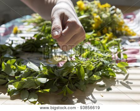 Woman Making A Swedish Midsummer Head Creation