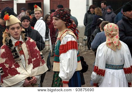 People In Traditional Costumes Celebrating The Winter Carnival