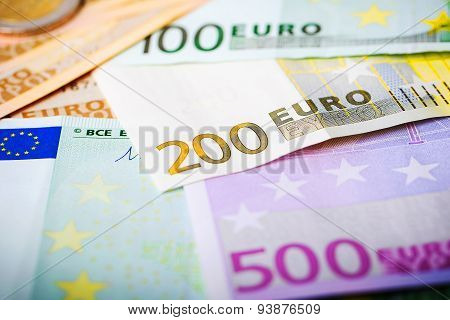 Closeup Of Euro Banknotes And Coins