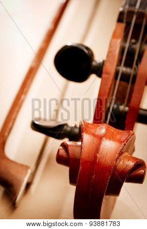 Close Up Of Violin Scroll And Pegbox