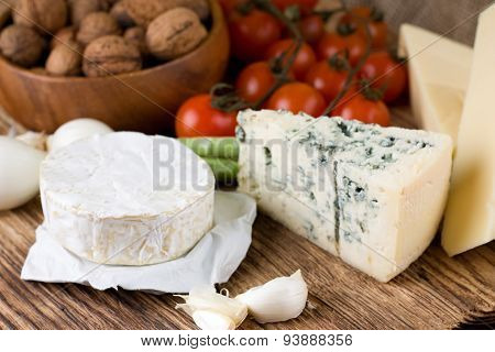 Whole Portion Of Camembert With Other Kinds Of Cheese