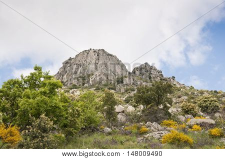 Views of Pico de la Miel (Honey Peak). It is a granite batholith located at  Sierra de la Cabrera, Madrid, Spain