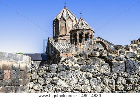 Remains of cyclopean wall by pagan temple surrounded by apostolic monastery Ohanavank