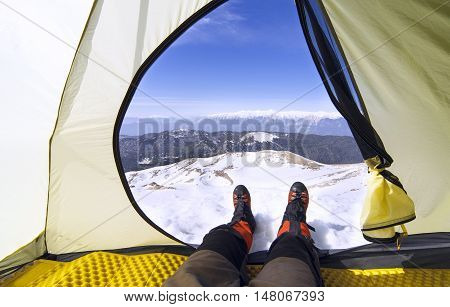 Camping on the top of the mountain in winter.