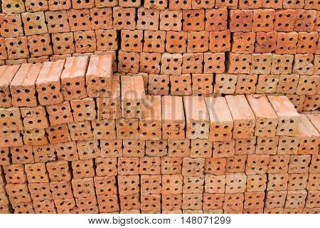 red brick wall texture grunge background with vignetted corners, may use to interior design
