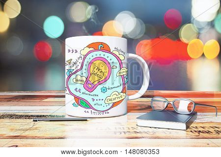 Closeup of wooden desktop with creative lightbulb sketch on coffee mug pen glasses and notepad on bokeh background. Idea concept. 3D Rendering