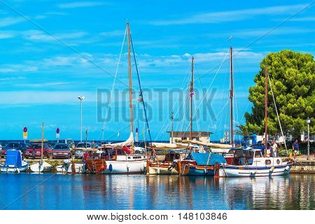 ISOLA SLOVENIA - AUGUST 30 2016: Boats in the Isola marina on bright summer day