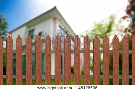 traditional fence with home & garden background included clipping path