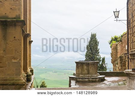 PIENZA,ITALY-APRIL 23,2016:panoramic views over the Tuscan hills from Pienza center during a foggy day.