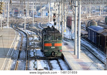 Electric locomotive in winter the hub of a big city