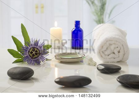 Aromatherapy candles burning and bath towels for a relaxation