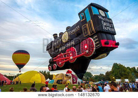 Ferrara Italy 16 September 2016 - A Special Shapes hot air baloon inspired by the famous Orient Express train at the Ferrara Balloons Festival