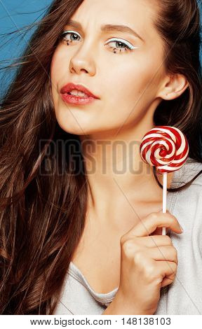 young pretty adorable woman with candy close up like doll makeup