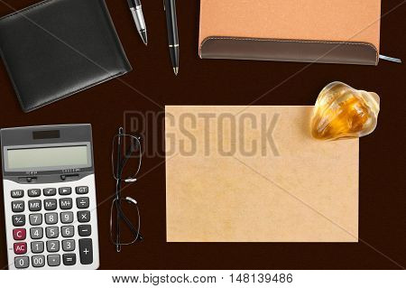 recycle paper note with paperweight & stationery on the desk