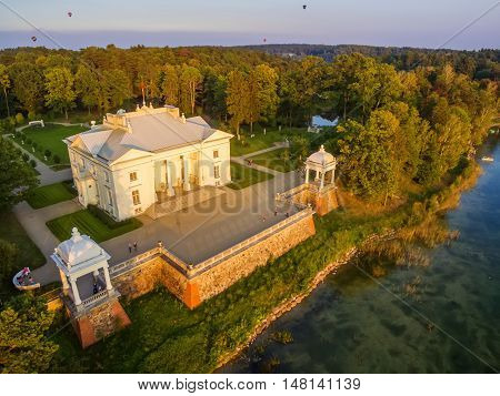 Trakai, Lithuania: Aerial UAV top view of Uzutrakis Palace in the autumn sunset