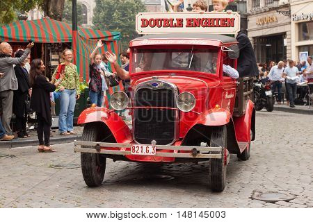 BELGIUM, BRUSSELS - SEPTEMBER 06, 2014: Belgian Beer Weekend 2014. The most famous beer festival in Belgium. Parade of beer manufacturers.