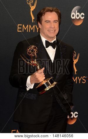 LOS ANGELES - SEP 18:  John Travolta at the 2016 Primetime Emmy Awards - Press Room at the Microsoft Theater on September 18, 2016 in Los Angeles, CA