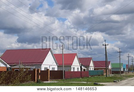 The Roof Of Corrugated Sheet On The Houses