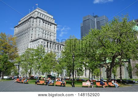MONTREAL QUEBEC CANADA 09 17 2016: Sunlife building in Montreal canada.The Sun Life Building is an historic office building at 1155 Metcalfe Street. Place ville Marie in background.