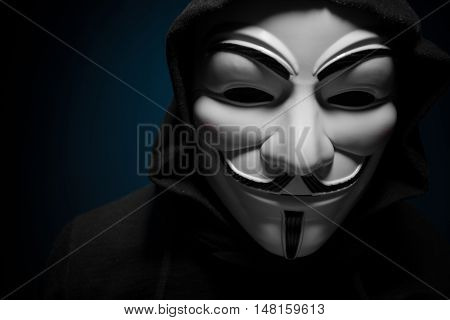 Saint-Petersburg, Russia - September 16, 2016: Photo of man wearing Vendetta mask, studio shot