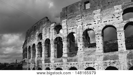 Coliseum with beautiful winter clouds in Rome (B/W)