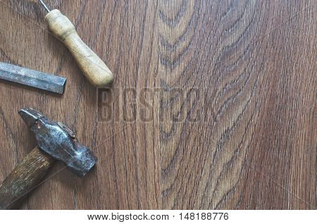 Different tools on a wooden background. Copyspace