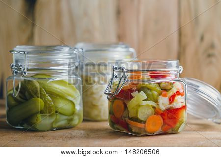 Pickled vegetables in glass jars