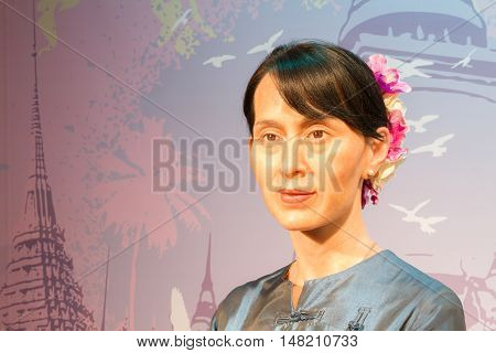 BANGKOK THAILAND - DECEMBER 19: Wax figure of the famous Aung San Suu Kyi from Madame Tussauds on December 19 2015 in Bangkok Thailand
