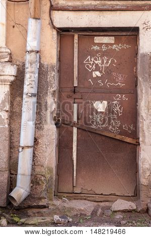 old locked door in the ramshackle old house