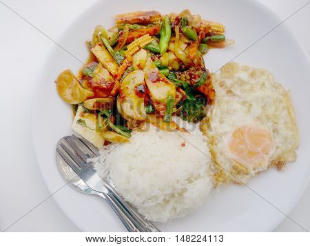 Stir Fried Mixed Vegetables With Roasted Chili Paste , Fried Egg & Thai Jasmine Rice On White Dish I