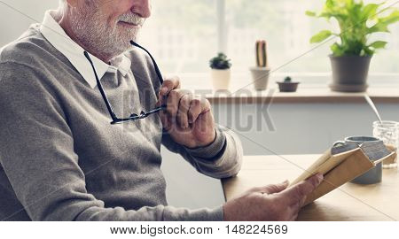 Senior Adult Reading Letter Concept