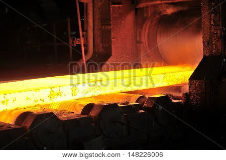 hot steel plate on conveyor in steel plant