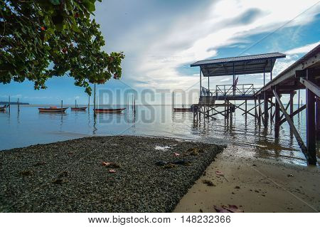 Morning view of the fishing jetty at Tanjung Aru village,Labuan Pearl of Borneo,Malaysia.The fishing industry contributes a significant income to islanders here.
