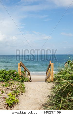 wooden staircase on the seashore